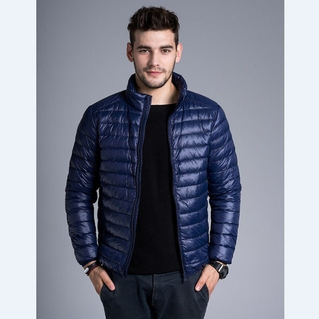 Męska zimowa kurtka z kapturem w kolorze granatowym